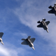 Illustration for article titled Cool photos of F-22s and F-35s flying together for the first time